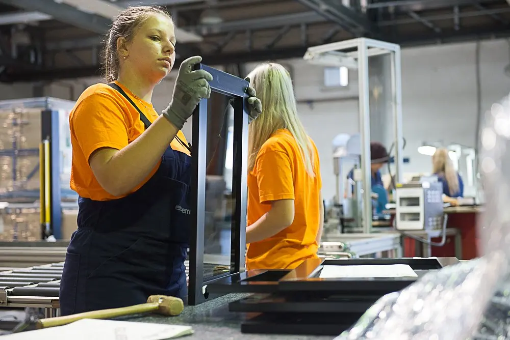 Operator assembling a frame